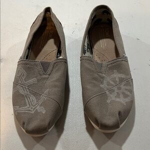 TOMS canvass slip on shoes.